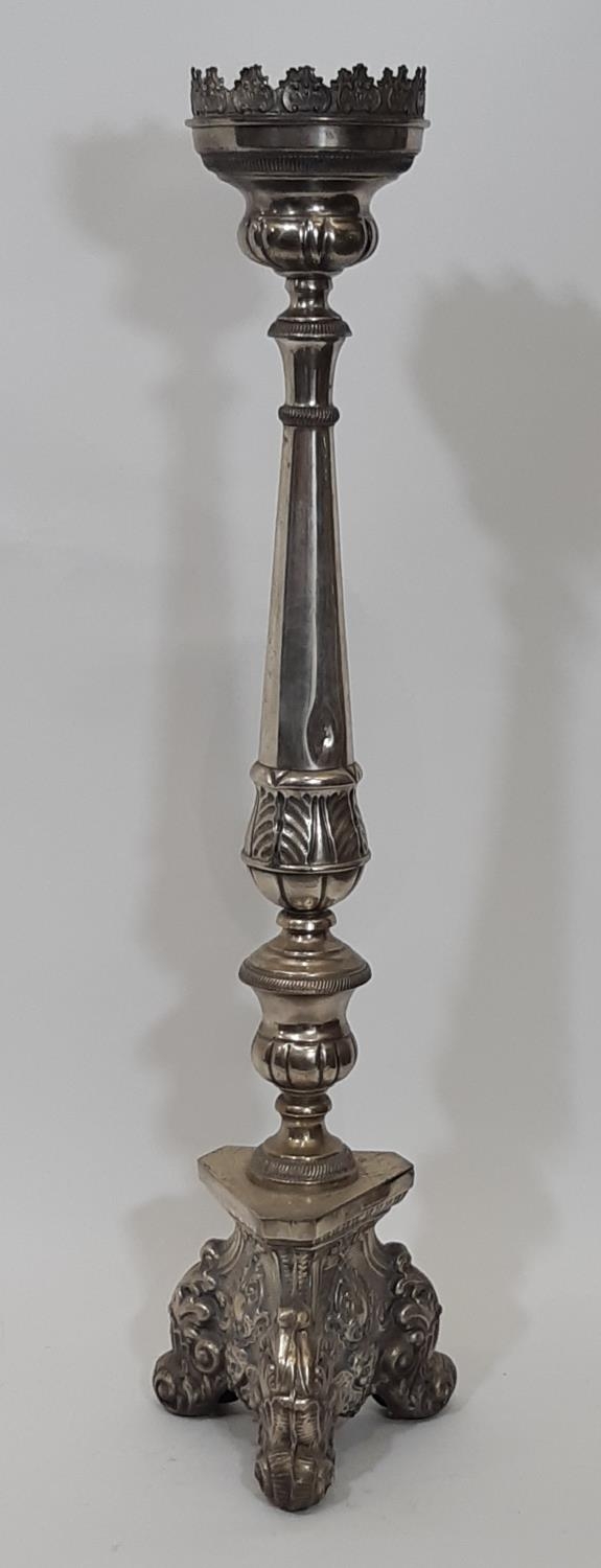 A tall 17th century ecclesiastical style chromium plated candlestick, 83cm high From the private