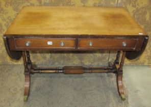 A reproduction Regency style sofa table, 74 cm high x 170cm (open) x 61 cm approximately, together