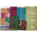 5 Indian saris by Krishna Sarees, unused in original packaging, together with 5 colourful silk saris