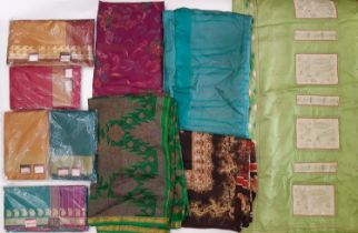 5 Indian saris by Krishna Sarees, unused in original packaging, together with 5 colourful silk saris