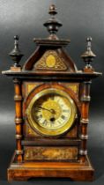 A small late 19th century German mantle clock, architectural form with inlaid case, 42 cm high, 23