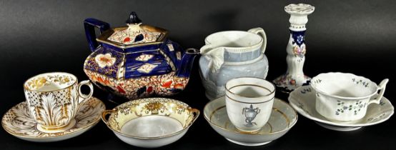 A small collection of 19th century English porcelain tea cups and saucers, hexagonal teapot with