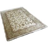 A Zeigler design carpet with an all over floral and frond pattern on a cream ground, 250cm x 170cm