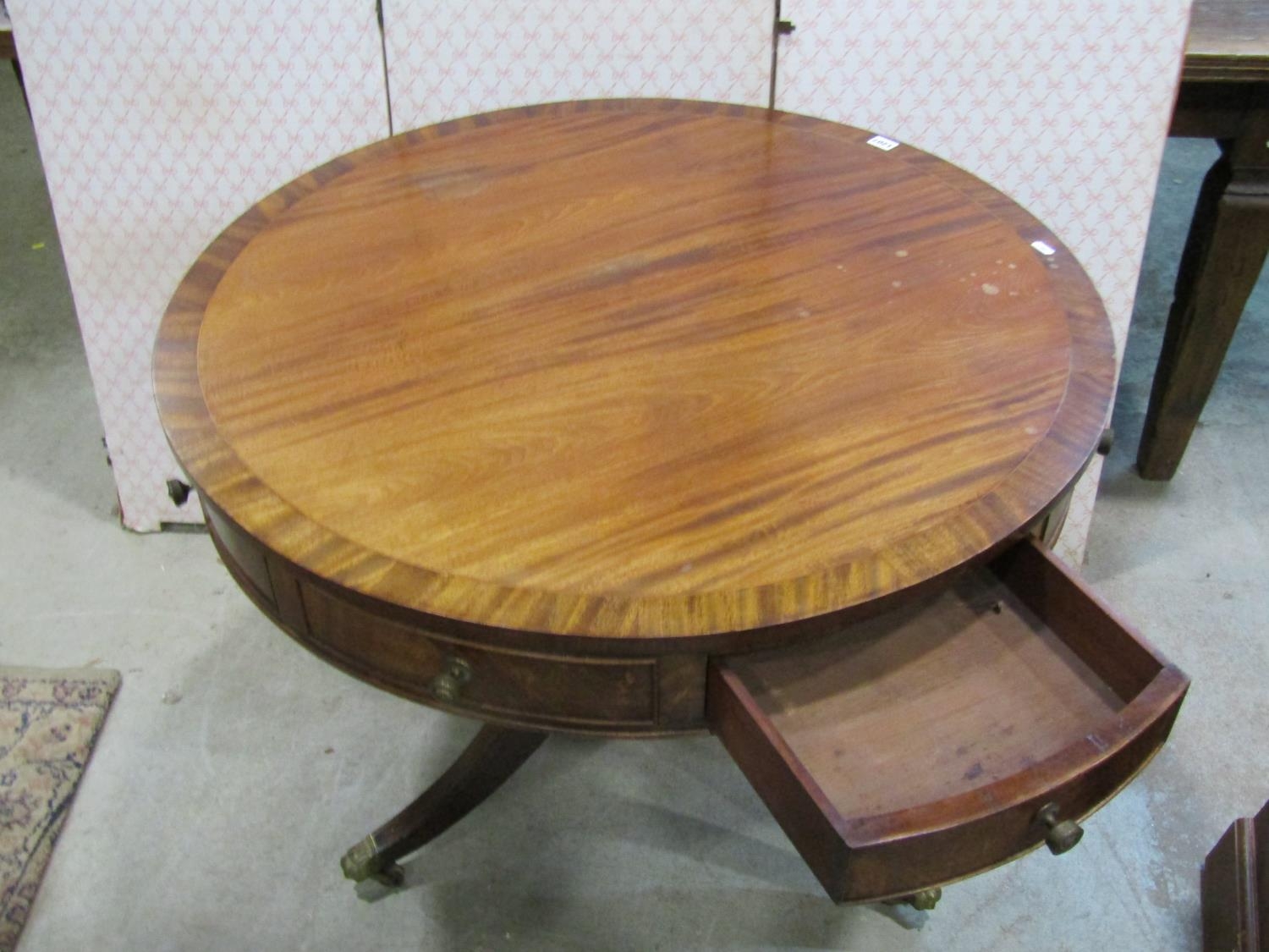 A Regency style drum table in mahogany, with alternating real and dummy drawers on turned support - Image 5 of 8