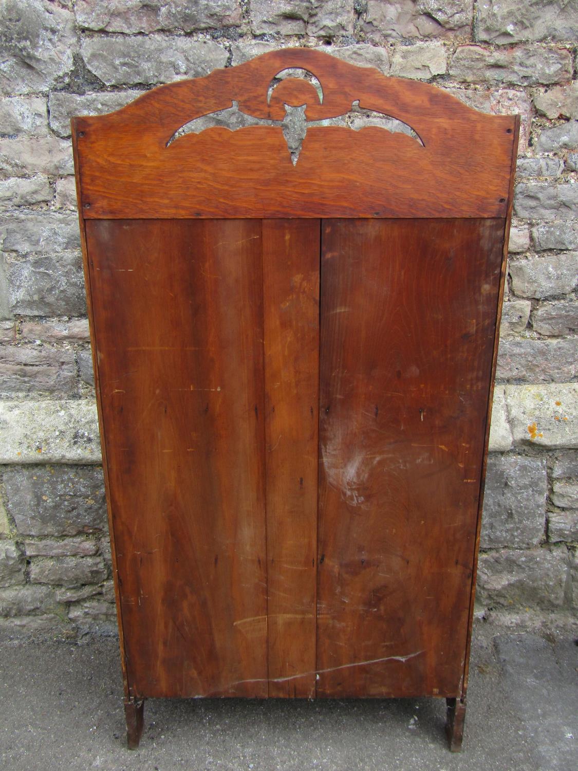 An early 20th century oak students bureau with strap hinges, the raised back with pierced detail - Image 4 of 5