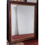 A Victorian rosewood cushion moulded mirror with gilded slip, 105cm x 85cm