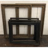 A pair of 19th century gilt gesso frames with seven hogarth frames of different sizes, gilt frame