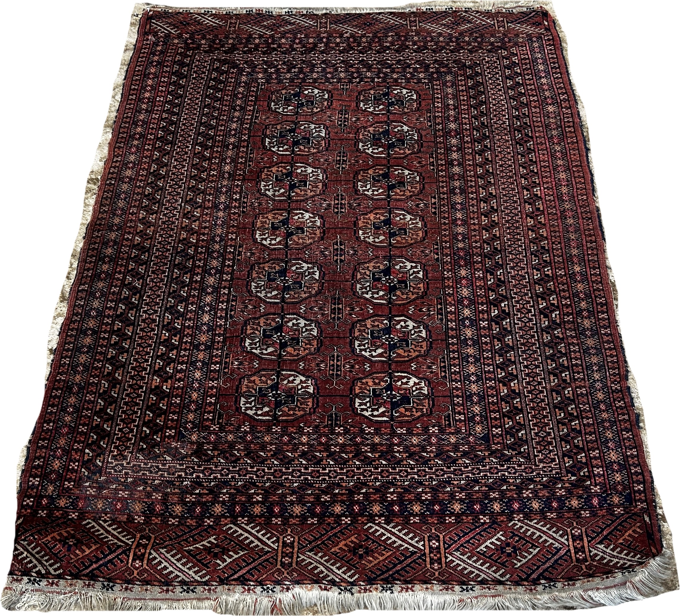 A Bokara Tekke rug with two rows of elephant foot guls on a red ground, 147cm x 103cm approximately - Image 2 of 3
