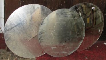 Three frameless convex wall mirrors of circular form, each 47cm diameter