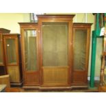 19th century mahogany breakfront three sectional cupboard with geometric brass grilled doors, fitted