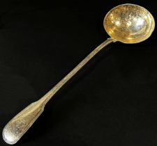 A William IV silver ladle, London 1835, makers mark rubbed, W? 35cm long, 8.5oz approx