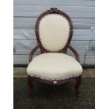 A Victorian mahogany spoon back chair with upholstered finish