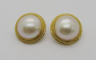 Pair of circular 18ct pearl clip earrings, 1.7cm diameter approx, 8.7g