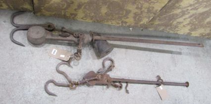 Two steel yard arms, one stamped Herbert & Sons Ltd, London to weigh 300 lbs