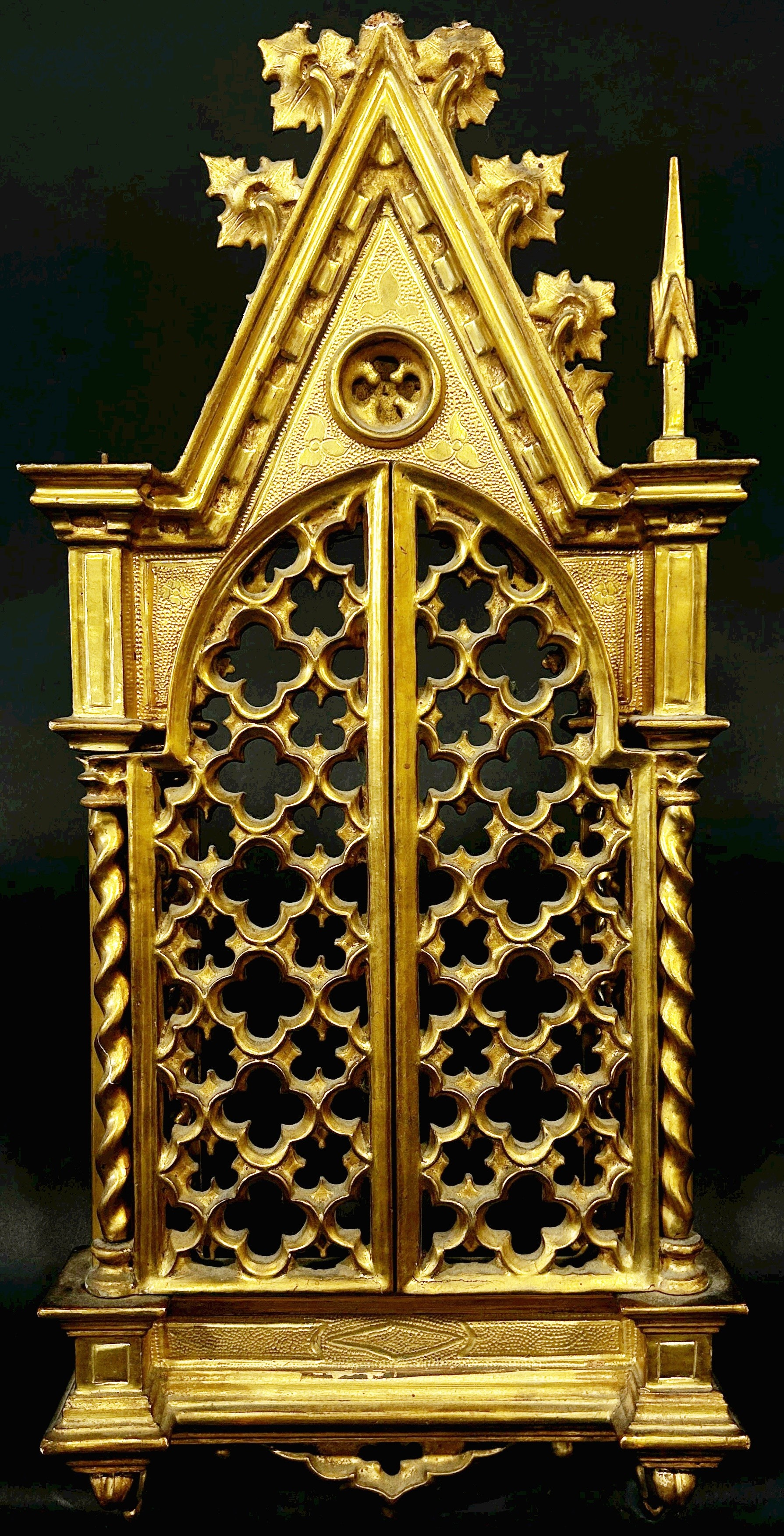 A 19th century Florentine style carved gilt wood gothic reliquary frame, of Puginesque form, the