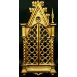 A 19th century Florentine style carved gilt wood gothic reliquary frame, of Puginesque form, the