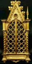 A 19th century Florentine style carved gilt wood gothic reliquary frame, of Puginesque form, the