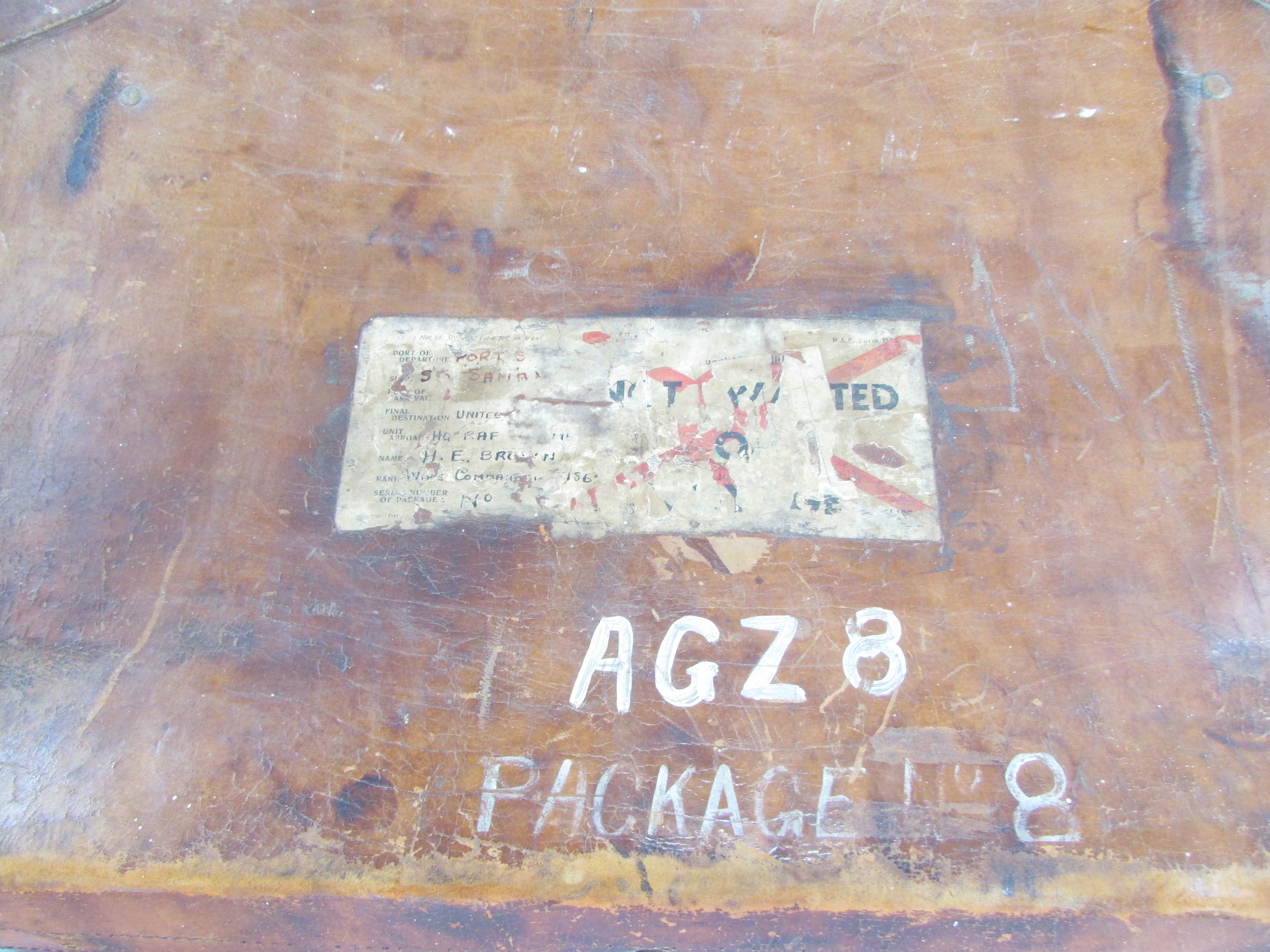 Two vintage battered leather suitcases, containing a miscellaneous collection of items including two - Image 2 of 9