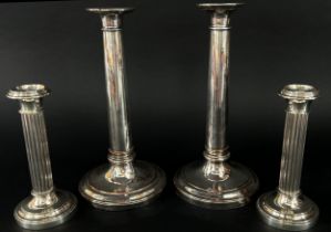 A pair of Dutch classical reeded column silver candlestick on a circular stepped base, maker Van