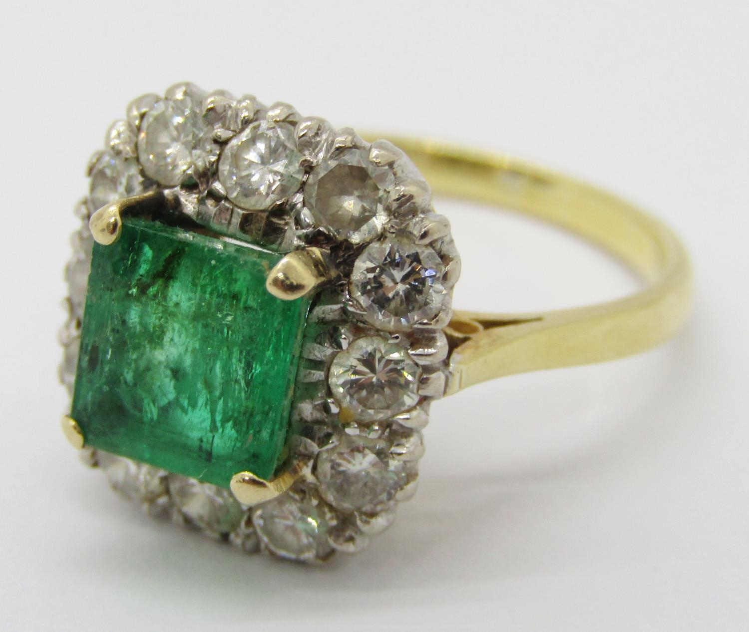 Mid 20th century 18ct emerald and diamond cluster ring, the emerald 7 x 7mm approx, size N, 5.3g ( - Image 7 of 8