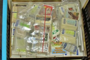 Large collection of cigarette cards loose - to be sorted (four boxes)