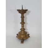 A heavy antique brass ecclesiastical brass pricket candlestick, the pierced castellated phone cradle