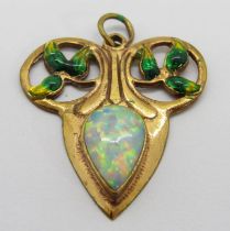 A silver gilt pear-cut opal and enamel pendant in the Arts & Crafts style, possibly by Murrle