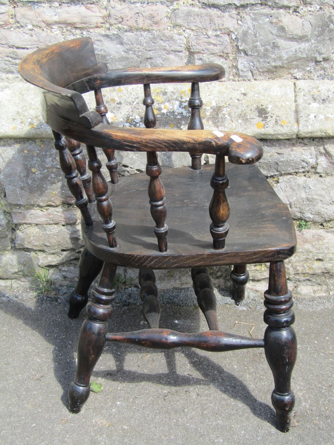 A Windsor smokers bow elbow chair principally in elm, with turned legs - Image 2 of 4