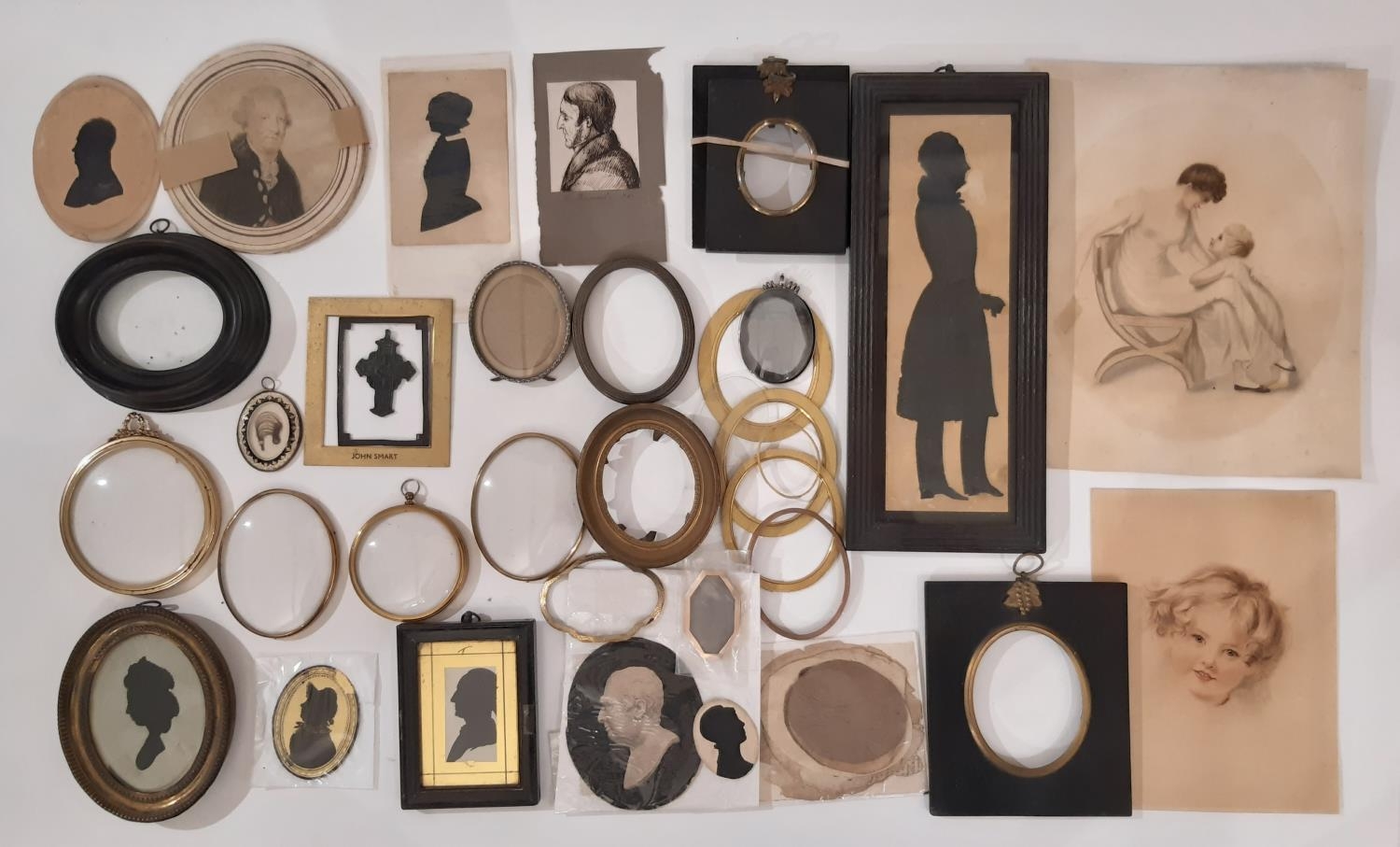 A collection of 18th-20th century objects, miniature portraits and silhouettes with frames and