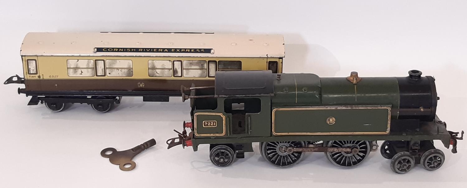 0 gauge clockwork 4-4-2 locomotive by Hornby in lined green GWR livery, total length 29cm together