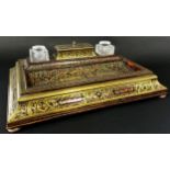 A 19th century boulle work standish with dished tray, segmented box and two cut glass inkwells, over