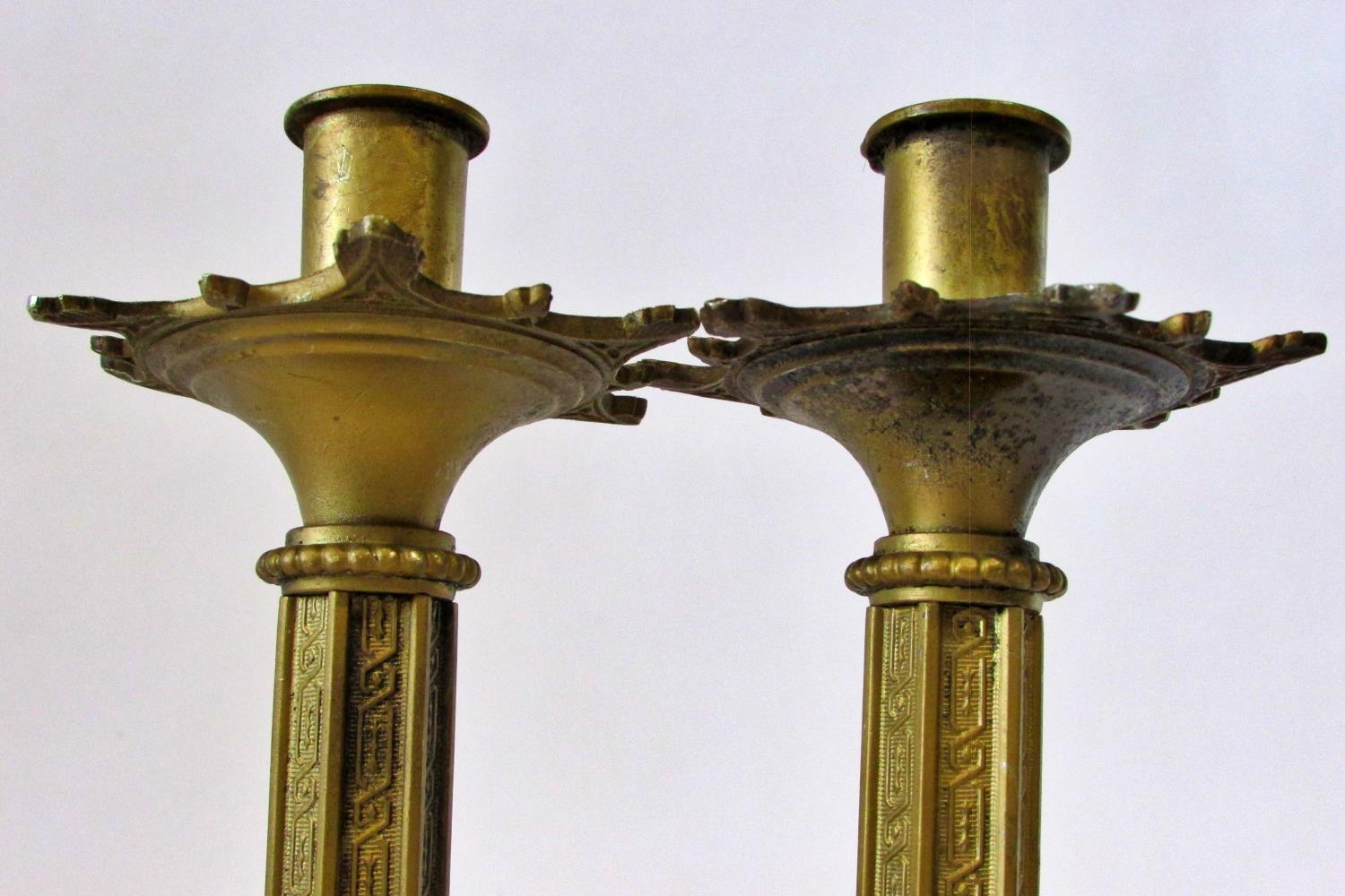 A small pair of late 19th / early 20th century continental cast metal Puginesque candlesticks, - Image 4 of 4
