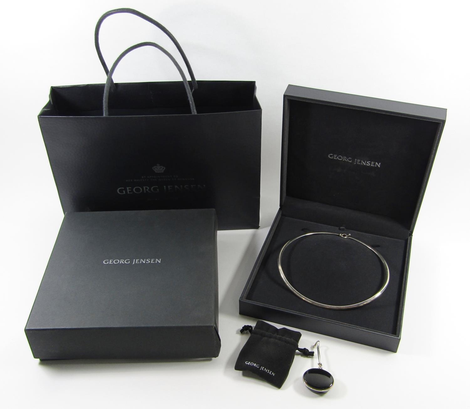 A Georg Jensen Viviana Torun silver pendant necklace, with removable onyx pendant, (models 410 and