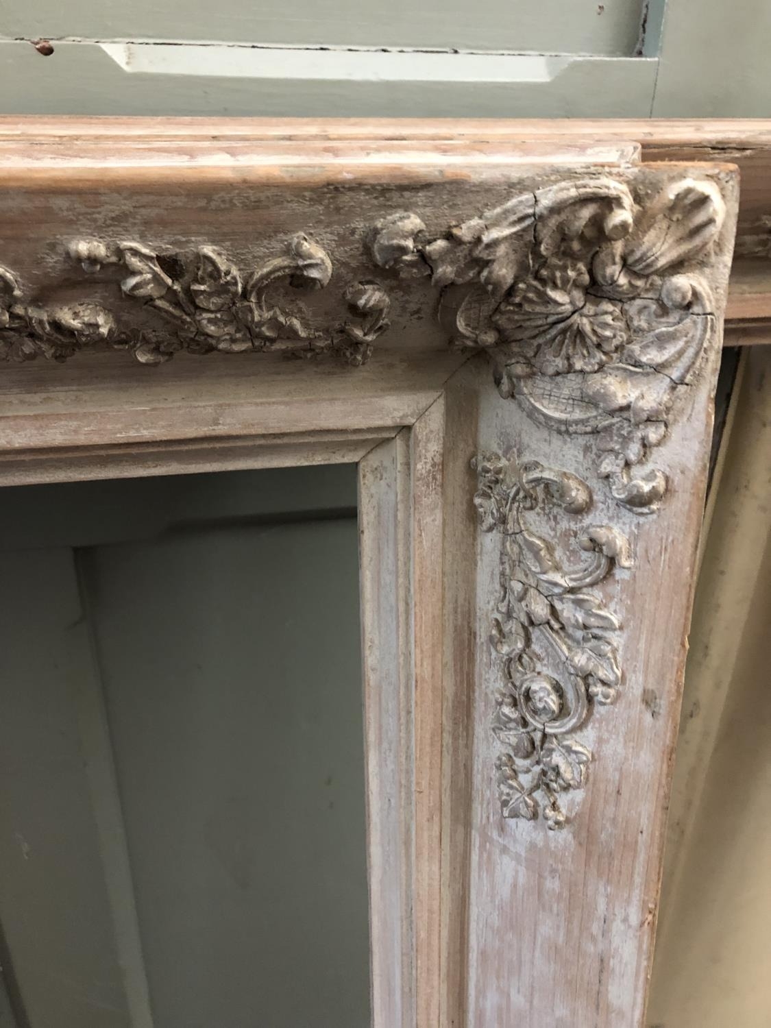 A pair of 19th century wooden frames with washed finish and moulded floral decorations to each - Image 2 of 3