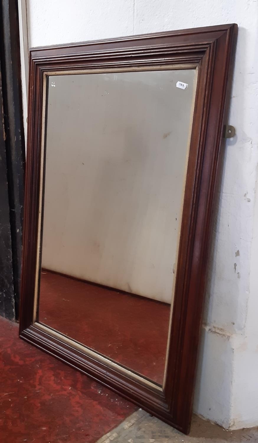 A simple 19th century wall mirror with stepped and moulded frame, 92cm x 65cm