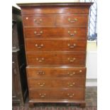 A Georgian mahogany chest on chest fitted with an arrangement of six long and two short drawers on