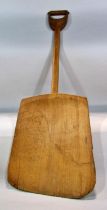 A Vintage brewer’s wooden malt shovel, 101cm long