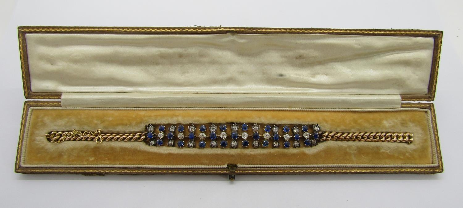 An Edwardian 15ct diamond and sapphire bracelet, centred with twenty-six diamonds and twenty-five