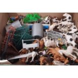 A boxful of Britains plastic farmyard toys including animals, figures, fencing, stys together with