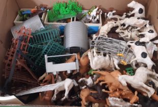 A boxful of Britains plastic farmyard toys including animals, figures, fencing, stys together with