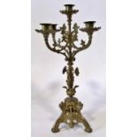 A 19th century continental cast metal five light candelabra, in the gothic style, 49cm high. From