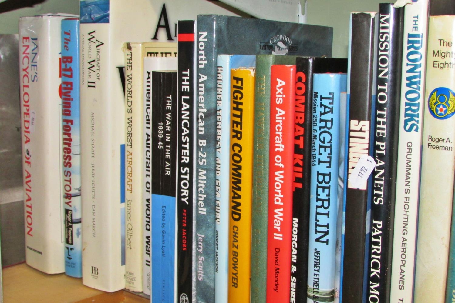 An extensive library of books of military / aviation interest (60+) to include pre & post WWII