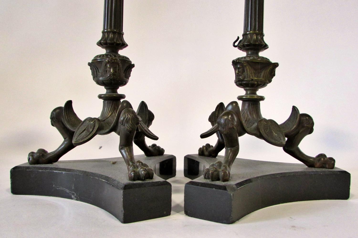 A pair of 19th century bronze candlesticks, in the form of tapering fluted columns raised on - Image 2 of 4