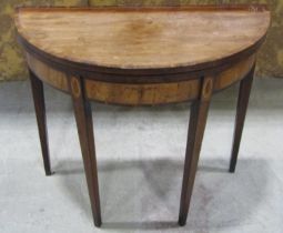 A Georgian mahogany demi lune card table with marquetry finish