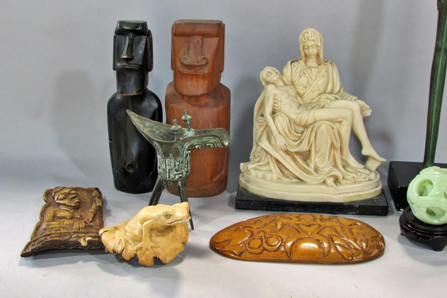A box of worldwide souvenirs, including, Bernini’s Pieta, Easter Island Heads, Chinese Libation Cup, - Image 2 of 3