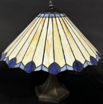 A Tiffany style lamp with a conical shaped “lead” segmented glass shade and two pyramid Tiffany