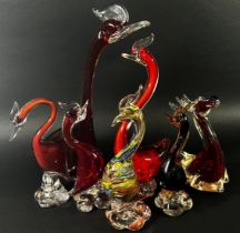 A collection of twelve Murano glass animals including a blue nosed reindeer, fish, ducks, a cockerel