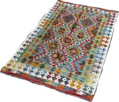 A Chobi kilim with a panel of alternating stepped diamonds, 150 x 103cm approximately