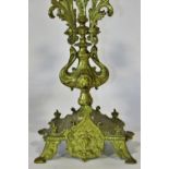 A pair of 19th century continental gilt-brass five light candelabras with scrolling acanthus