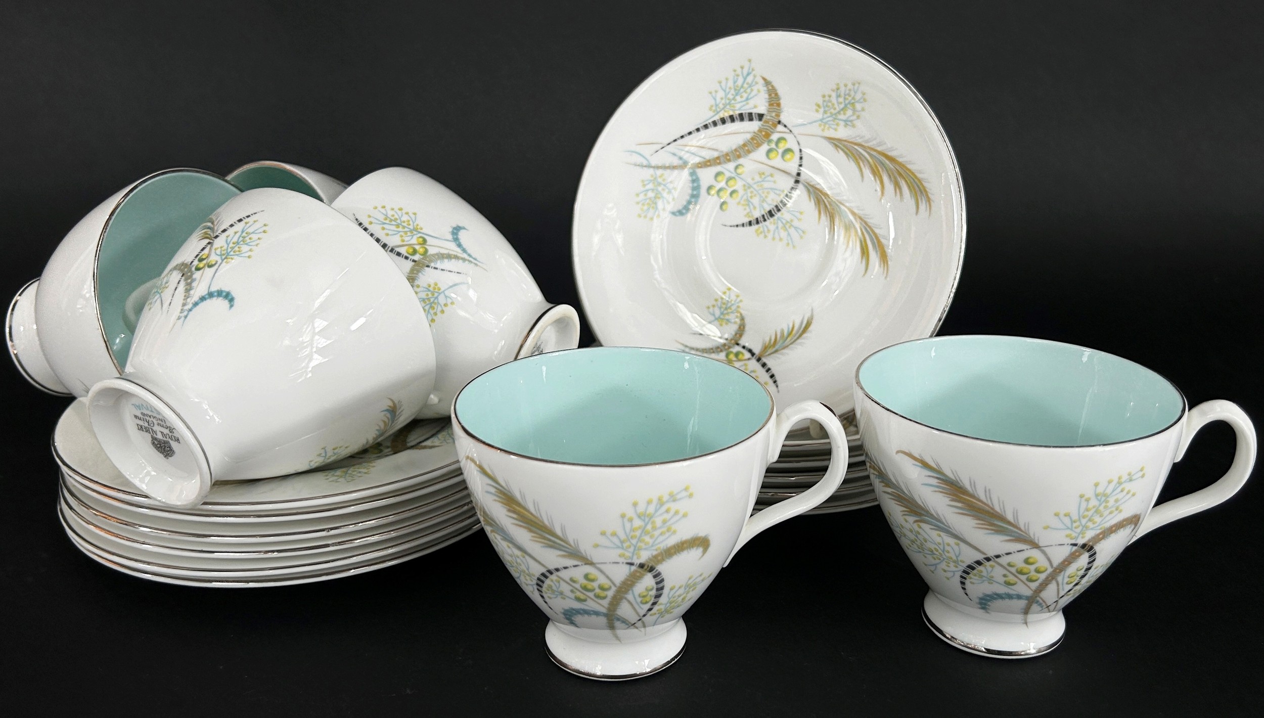 A Royal Albert festival pattern tea service for six, circular bowl with floral sprays with sponged